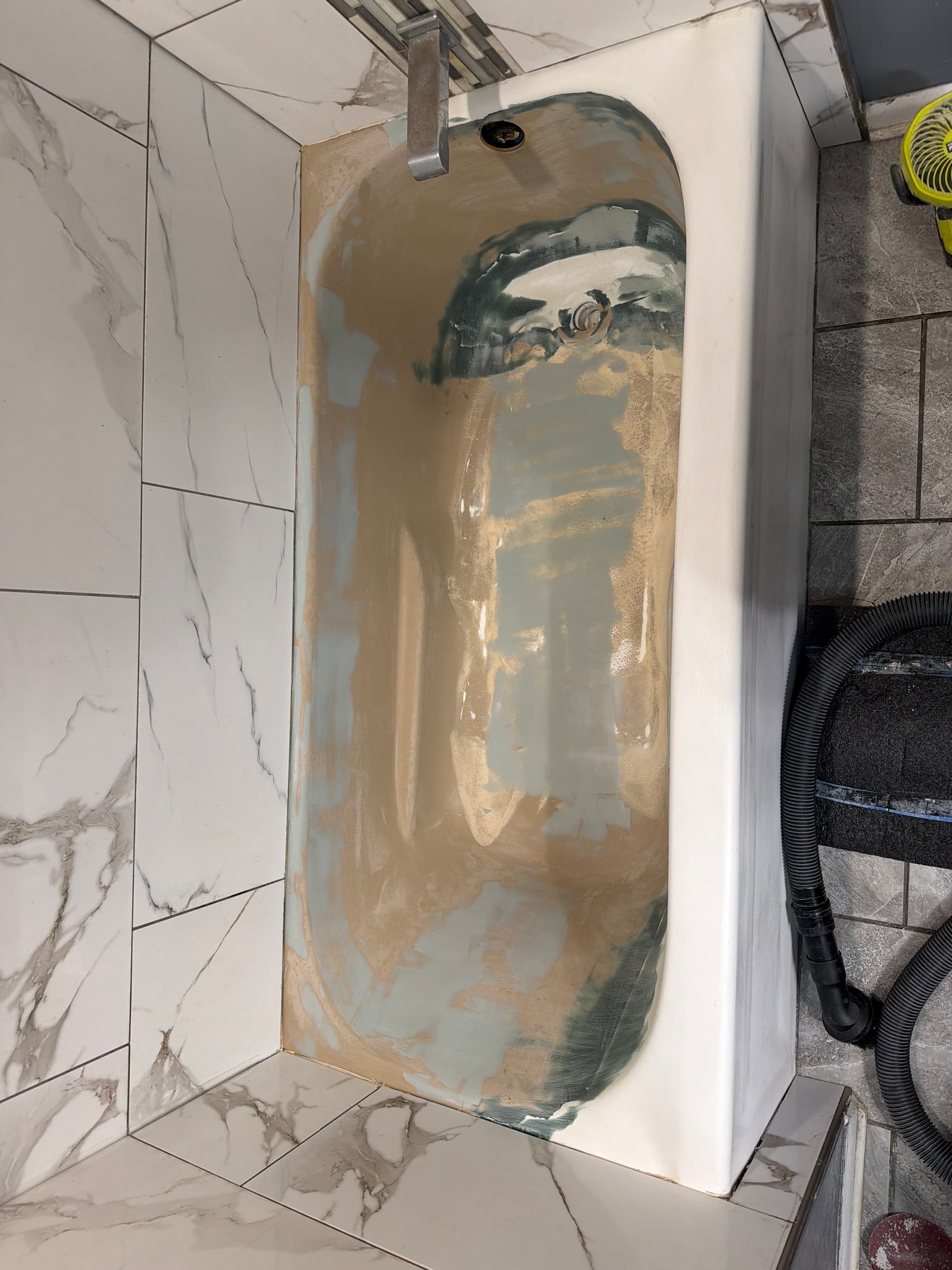 Gallery photos for When a Tub's Factory Finish Fails It Takes Real Repair Work: Image #5