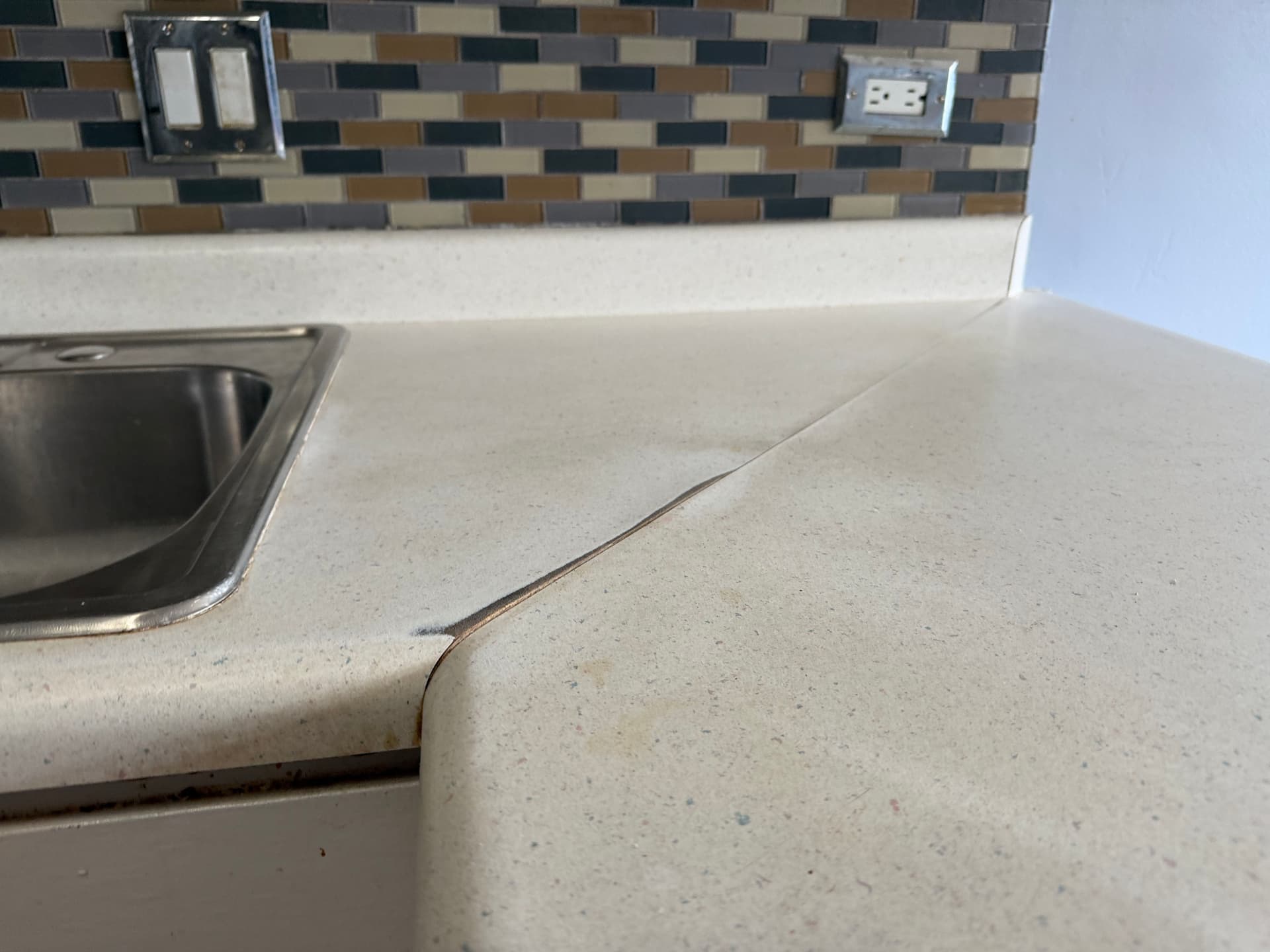 Gallery photos for Dated Vinyl Kitchen Counters Get a Stone-Look Finish: Image #3