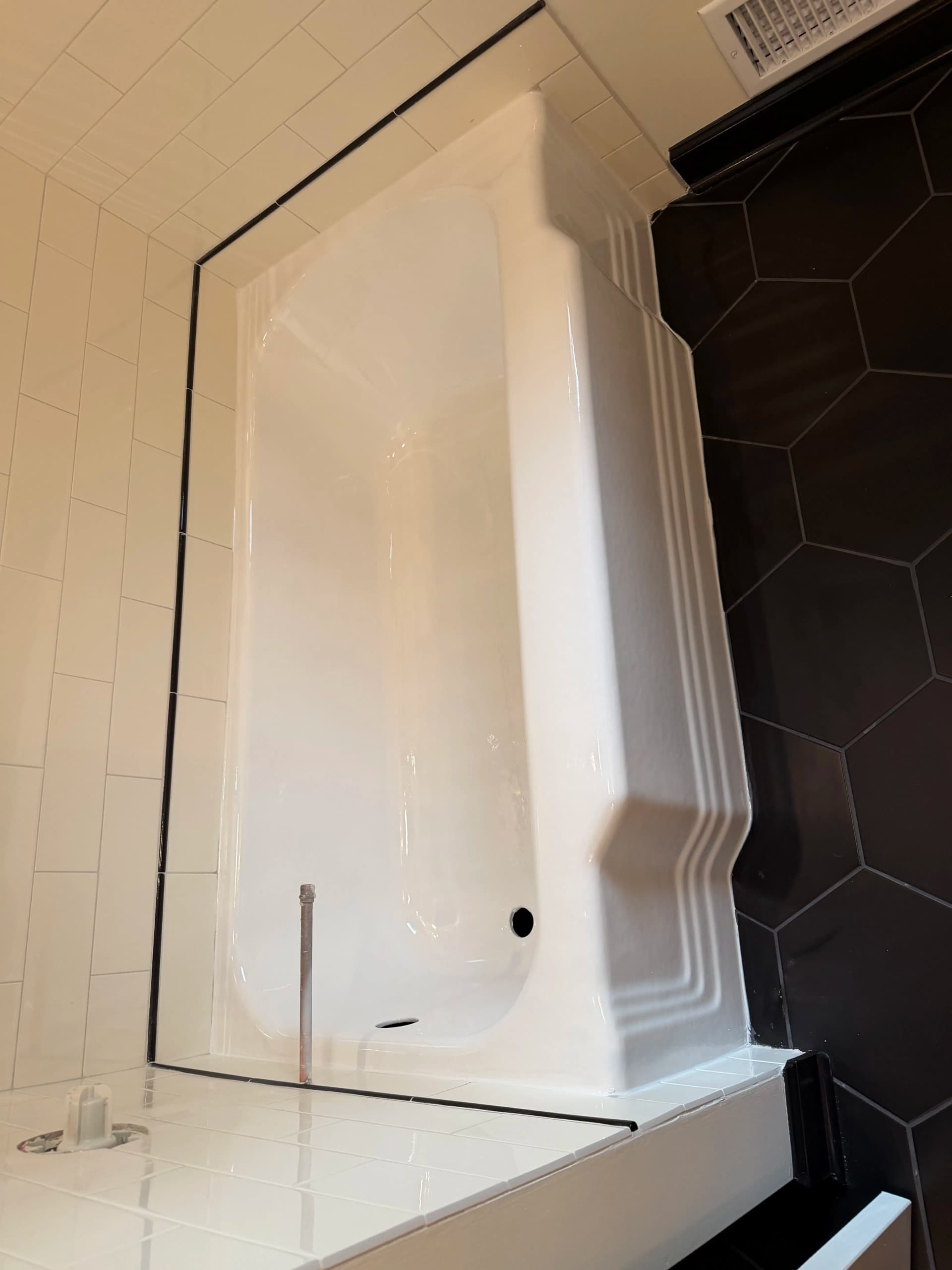 Gallery photos for Old Pink Tub Gets a Fresh White Finish for New Homeowners: Image #1