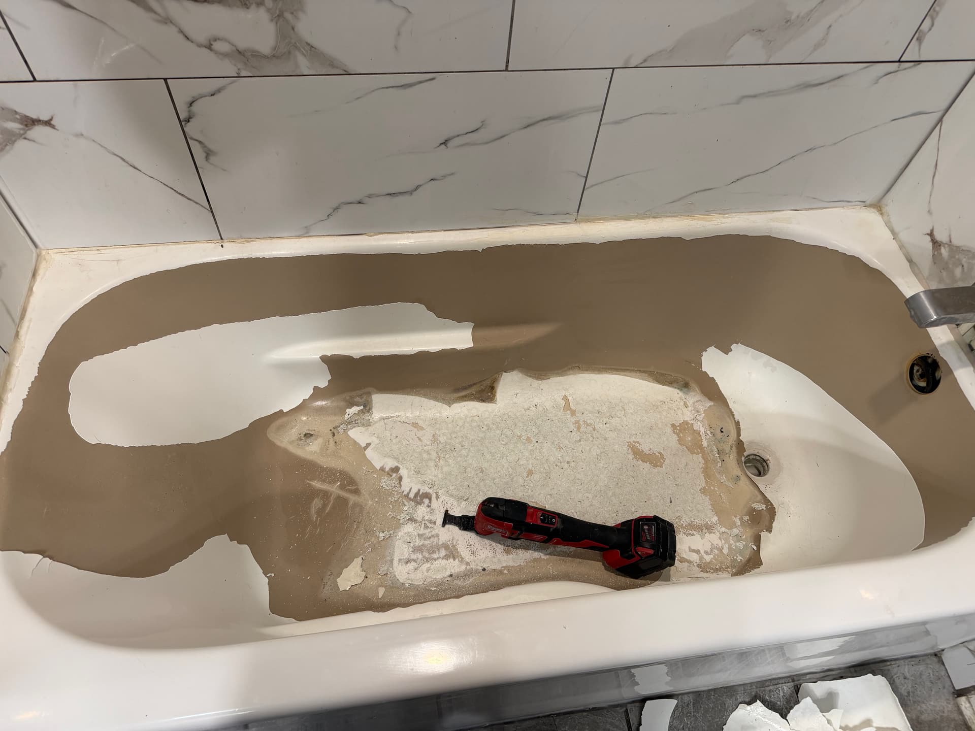 Gallery photos for When a Tub's Factory Finish Fails It Takes Real Repair Work: Image #1
