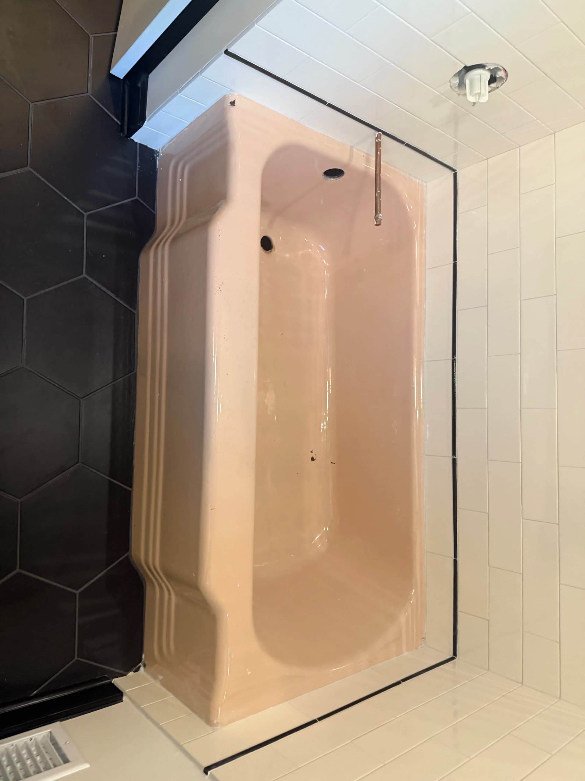 Old Pink Tub Gets a Fresh White Finish for New Homeowners image