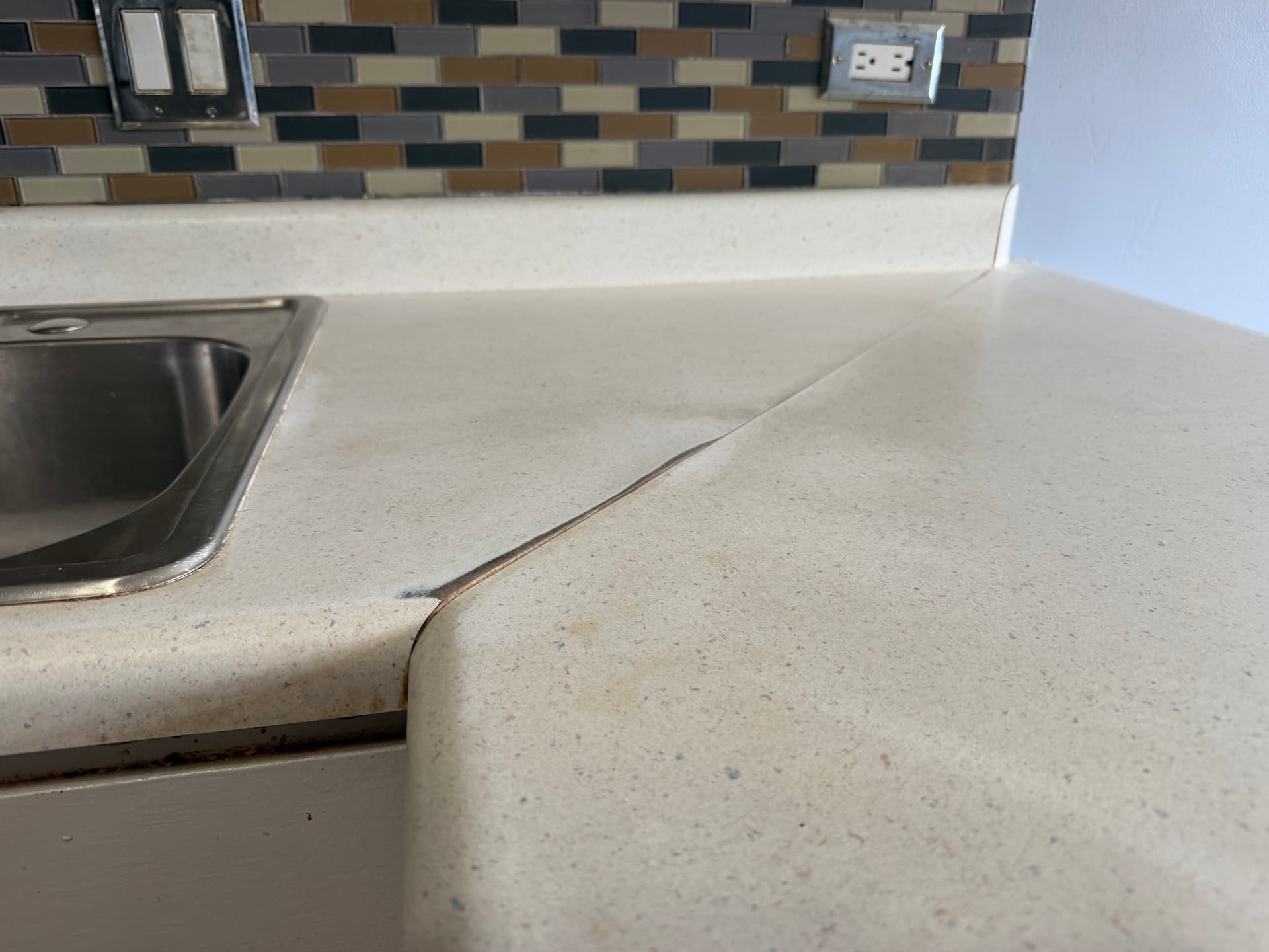 Gallery photos for Dated Vinyl Kitchen Counters Get a Stone-Look Finish: Image #2